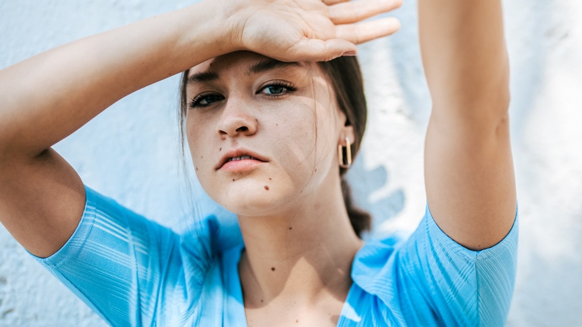 woman in blue crew neck shirt